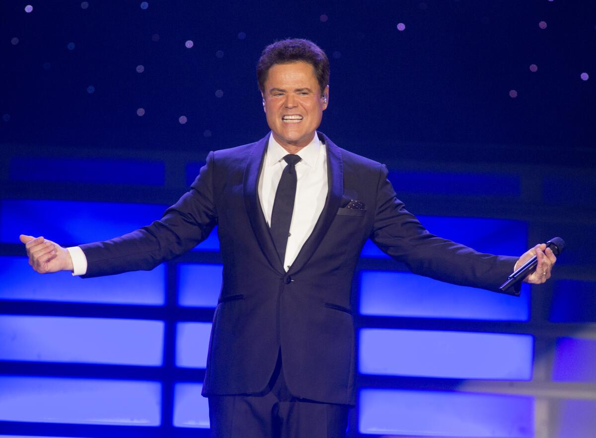 Revealing a special moment about the hug between Priscilla and Donny Osmond