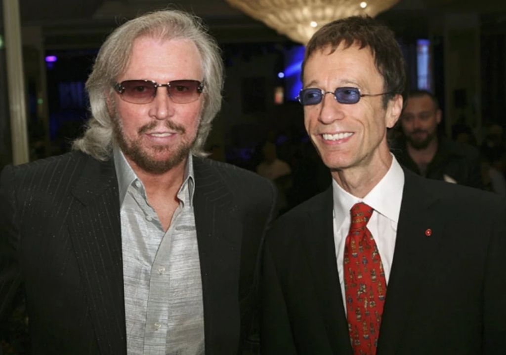 They wrote about love, loss, and devotion — yet for over a year, Barry and Robin Gibb couldn’t speak to each other. The truth behind their silence is more emotional than any song they ever wrote.