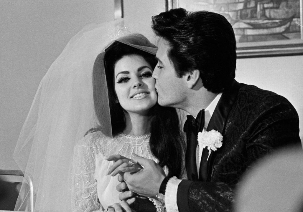 WORLD-STOPPING BREAKING — 48 Years of Silence Shattered. Elvis Presley steps out of the shadows with Priscilla and Bob Joyce. A buried truth explodes live, exposing the forces behind his disappearance and clearing Joyce’s name—leaving the world in shock.